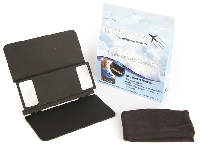 Illustration for article titled Win the Airplane Elbow Rest Fight With This Clever Portable Wall